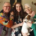  Steve Bush (left) with his daughter Grace, wife Janine and family doggo, Katniss (also known as...