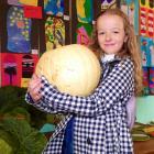 Showing off her prize-winning pumpkin is Marissa Crawford, of Roxburgh. PHOTO: SIMON HENDERSON