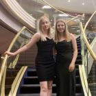 Enjoying a formal night while stranded on board a cruise ship barred from docking over...
