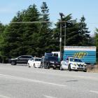 Police attend a minor crash at the Mt Iron intersection yesterday. PHOTO: MARK PRICE

