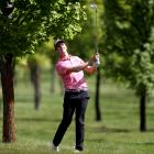 Leading New Zealander Harry Bateman plays an approach shot at Millbrook during the first round of...