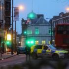 Police is seen near a site where a man was shot by armed officers in Streatham. Photo: Reuters