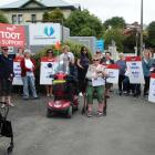 Protesters outside Healthcare NZ’s Oamaru office in Coquet St yesterday, demonstrate against a...