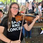 Dunedin Symphony Orchestra violinist Frances Christian-Farrow (20) takes part in the Save RNZ...
