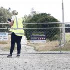 Officials at the scene following the incident last year. Photo: Giordano Stolley