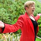 Lois Johnston, of Careys Bay, sang an aria for her neighbours from her balcony on Sunday. PHOTO:...