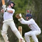 Green Island opener Geordie Scott looks to guide the ball past North East Valley wicketkeeper...