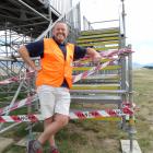 Warbirds general manager Ed Taylor in front of the grandstand being taken apart yesterday. PHOTO:...