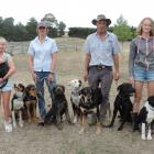 Ramona and Jim Sidey with their daughters Millie, left, and Hannah, and their team of dogs at...