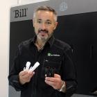 FI Innovations sales and marketing manager Carl Johnston stands next to the 3-D printer capable...