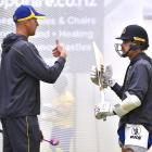 Anton Roux (left) speaks with Volts allrounder Michael Rippon. Photo: Getty Images 