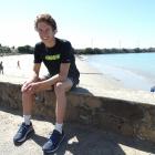 Austin Carter relaxes at Friendly Bay, Oamaru, after winning the men's open section of the Oamaru...