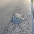  Brodie Grave was traveling down Jones Rd when he hit this pothole causing his tyre to blow.