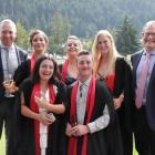 Pictured (from back left) are college chief executive Charlie Phillips, graduates Shayle Nicolay...