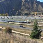 Pipes are stored near the base of the Waitaki dam, ready to be laid in the Kurow Duntroon...