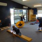 Wanaka primary AP Jason Cowan works with children from room 12 year 2 on their skipping, crawling...