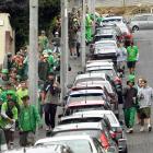Dunedin students make their way down Park St towards a flat party in Queen St to celebrate St...