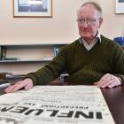 Public health researcher Warwick Brunton with an original public health warning poster produced...