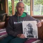 Gary Allpress holds a photo of his uncle Bruce; the Dunedin-raised actor died last week. PHOTO:...