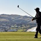 Big shot ... Neville Idour hits at the St Clair Golf Club yesterday. Photo: Peter McIntosh