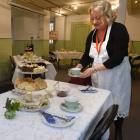 Olveston Historic Home guide Viv Houston serves an afternoon tea in the drying room. PHOTOS:...