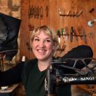 Dunedin shoemaker Flora Knight shows off one of the boots she worked on for television show The...