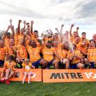 The North Otago team celebrates with the Meads Cup after beating Wanganui in the final at...