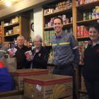 Tiwai worker Sam Patton, Southland Food Bank chairman Peter Swain, Salvation Army Community...