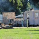 Fire and Emergency New Zealand and police are continuing their investigation into a house fire in...