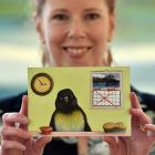 Gallery De Novo’s Liz Fraser displays a postcard by Gabby McKenzie, which reflects on the artist...