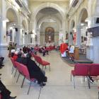 Fr Gerard Aynsley welcomes back parishioners to St Patrick’s Basilica in Dunedin yesterday during...