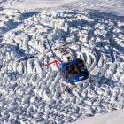 A Totally Tourism helicopter delivers customers to Fox Glacier. PHOTO: TOTALLY TOURISM