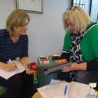 Wanaka volunteers Julia Larkin (left) and Rachelle Blatch at the Wanaka Community Hub distribute...