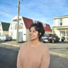 Agnew St resident Yashna Shetty stands in the Dunedin street where last year about 2000 party...