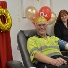 Doug Armishaw, of Dunedin, donated blood for the 350th time, supported by donor technician Vicki...