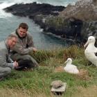 Prince Charles and then head ranger at the Royal Albatross Centre, Lyndon Perriman, look at a...
