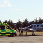 An ambulance was called to take a patient to Dunedin Hospital after the plane they were on was...