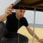 Questioning . . . The late artist Paul Cullen at work. Photo: Supplied