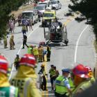 Emergency services at the scene of a serious crash on the Queenstown-Glenorchy Rd, near...