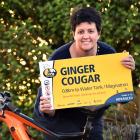 Mountain Biking Otago president Kristy Booth says goodbye to one of the signs deemed ‘...