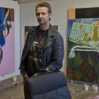 Artist Pete Wheeler takes a break in his make-shift Dowling St studio. PHOTO: GERARD O’BRIEN