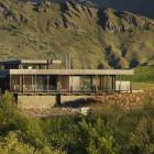 Corten steel, shuttered concrete and schist give this Speargrass Flat home a rustic look and help...