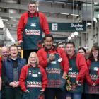 Bunnings team member Peter Trevathan, of Dunedin, is celebrated by his colleagues, friends and...