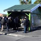 About 20 people attended a meeting to discuss the potential removal of a historic bus stop from...