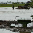 A picnic table in Arthur Strang Reserve, Balclutha, gets wet feet thanks to an overflowing Clutha...