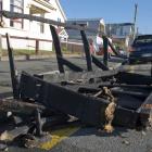 The remnants of a couch sit on the corner of Leith and Frederick Sts yesterday following a busy...
