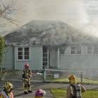 This Corstorphine house was extensively damaged by smoke during a fire yesterday. PHOTO: GERARD O...