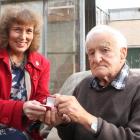 Lesley Soper gives the 1909 medal (pictured right), found in her family’s archives, to her cousin...