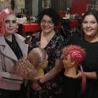 Hairdressing apprentices Rebekah Morton (left) and Tash Williamson (right) display their award...