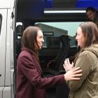 After patiently braving the cold, a young woman was able to have a quick chat with 
...